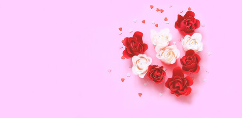 Festive concept from rosebuds on pink background. Template mock up of greeting card or text design....