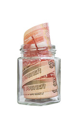 Russian five thousand banknotes in a glass jar. Investments and savings during the financial crisis. Isolated on white background. Vertical.
