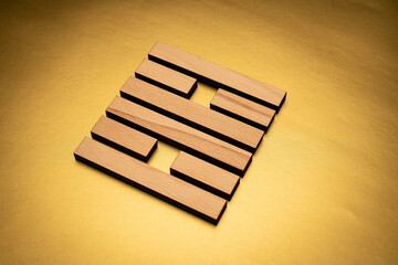 Gene Key 30 hexagram I ching wood on golden background