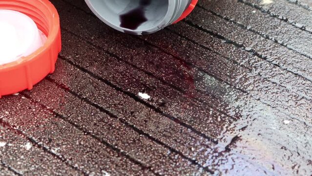 Chemicals from industry or laboratory  leak on the floor and damage the environment, chemical symbol