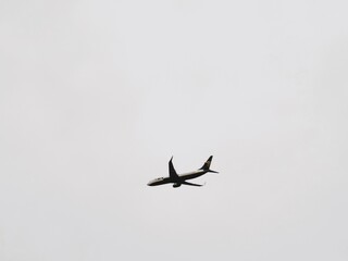 A plane flying high in the sky