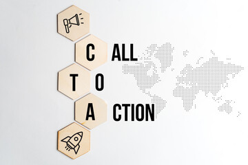 Concept call to action or CTA. Text and icons on wooden blocks