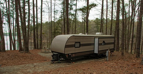 Jordan lake behind a camping trailer