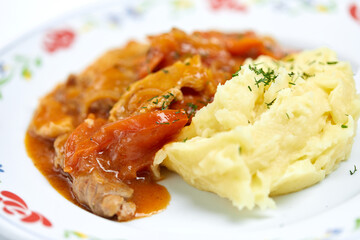 meat with mashed potato and vegetables