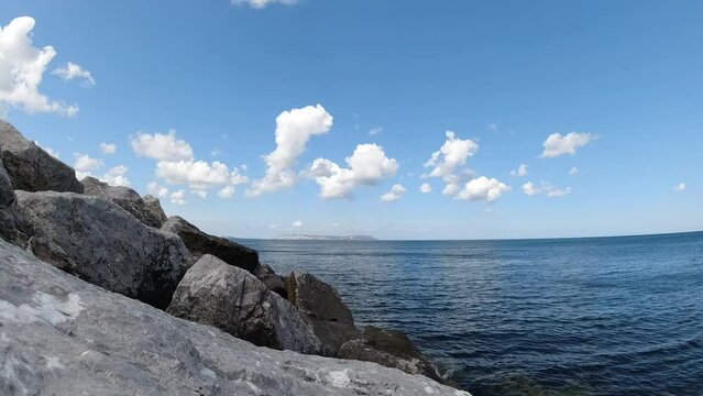 Time lapse video footage of clouds over the sea in sinop island view