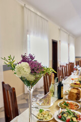Bouquet of fresh flowers on a festive table.
