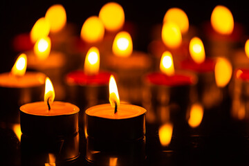 candle,burning candles on the dark surface of remembrance day
