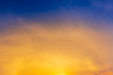 orange sky and clouds background,Background of colorful sky concept, amazing sunset with twilight sky and clouds.