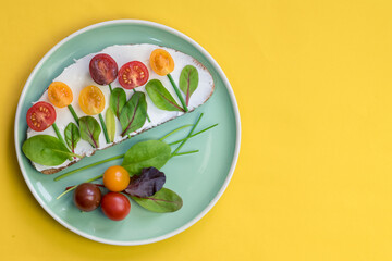 bread with tomatoes on plate, fresh breakfast or dinner plate isolated on orange background