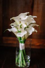 magical rustic wedding tables outside in the garden with hanging light and flowers, chairs, outdoor ceremony in the open air
