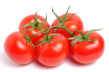 Red and ripe tomatoes white background.