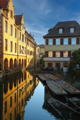 Reflection of traditional half-timbered houses on water at Colmar , Alsace rigion, France
