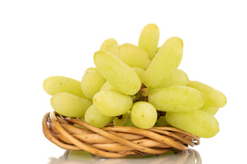 One bunch of white seedless grapes with a vine wreath, close-up, isolated on a white background.