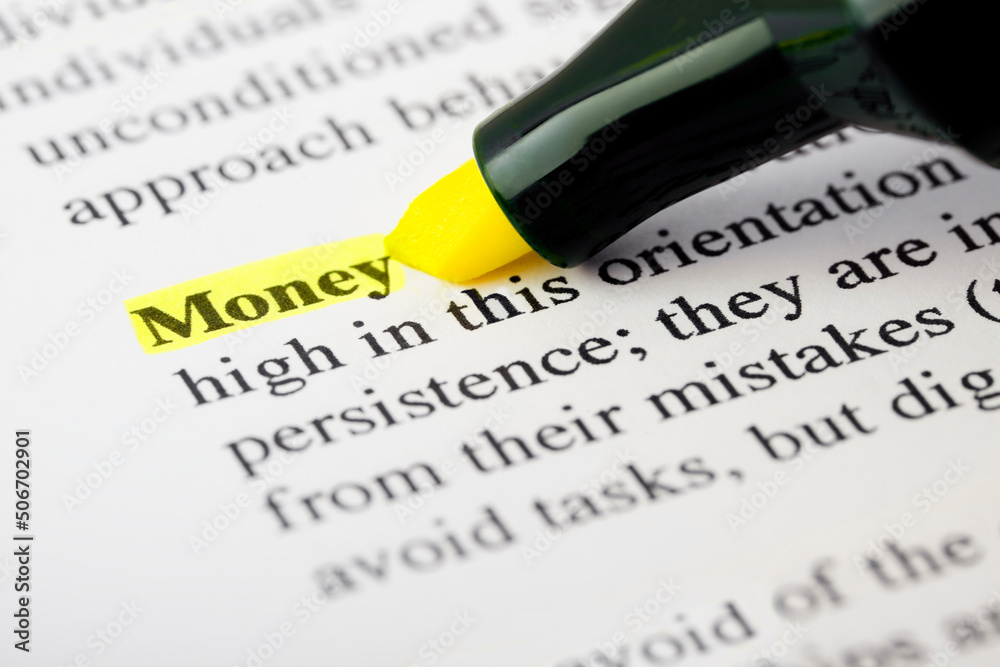 Fototapete investment text macro shot highlighted with a highlighter in yellow color on printed paper