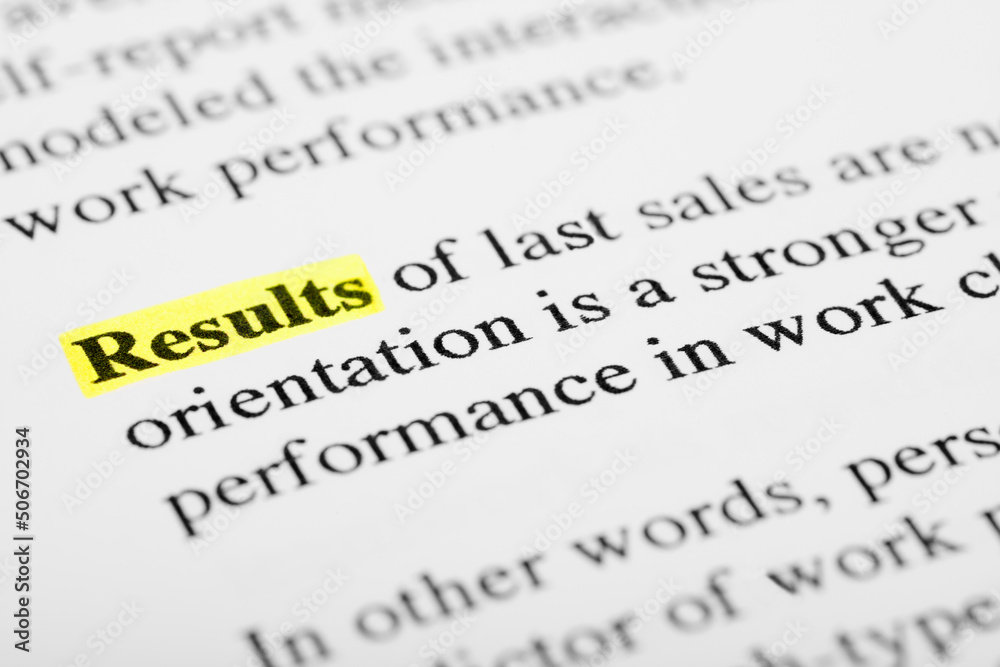 Fototapete results text macro shot highlighted in yellow color on printed paper