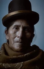 Foto op Canvas Studio portrait of an elderly woman wearing traditional costume. © MiguelAngel