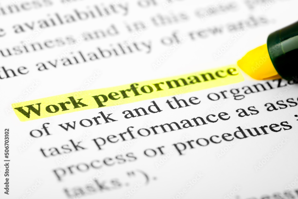 Fototapete work performance text macro shot highlighted with a highlighter in yellow color on printed paper