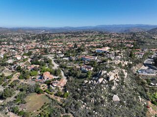 Fototapeta premium Aerial view of middle class neighborhood with villas in South California, USA