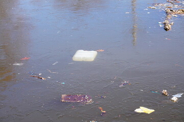 Garbage, Trash, disposable used products, and human waste floating around in the rivers