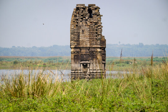 An ancient historic temple with in a ruined state standing in water at Telkupi Puruliya west bengal India