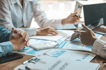 Business man group are meeting together in the office, they are meeting on the topic of finance and financial management, they are business partners. Concept financial management for startup companies