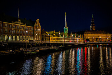 Naklejka na ściany i meble Night cityscape of Copenhagen city by the river side, Denmark
