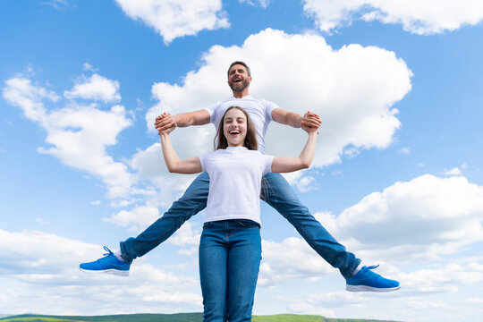 happy father and daughter have fun in sky