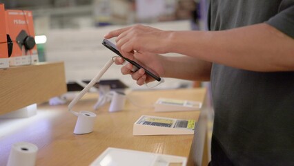 Unrecognisable buyer picks up a new phone