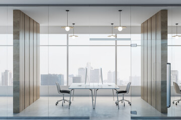 Light stylish office room with glass walls, wooden partitions, modern computers on minimalistic tables and city view from huge window. 3D rendering