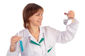 Female scientist examining a chemical reaction in a test tube