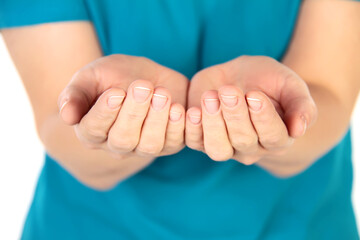 Close-up of a woman open palms of two hands for prop up for something; or beg for something....
