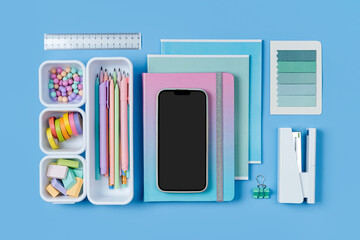 Smartphone mockup and stylish school stationery is arranged in organizers. Creative Organizing. Storage office supplies. Concept online learning.