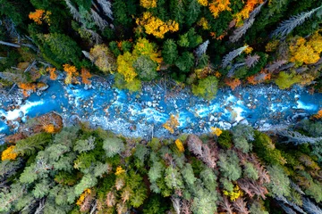 Fototapete Waldfluss Drone aerial top view of mountain river and forest