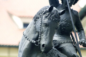 Detail of a St George statue from 1373. The head of the horse is seen and a part of St George and his lance