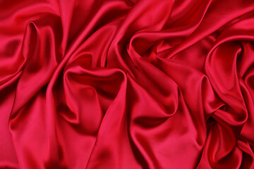 Obraz premium Closeup of rippled red silk fabric texture