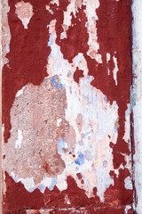 Grungy Red Wall with Peeled Paint Background Texture