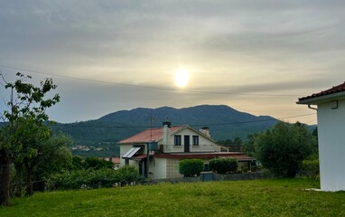 Fototapeta na wymiar beautiful white house with a red roof in the mountains of Portugal Portuguese flavor. High quality photo