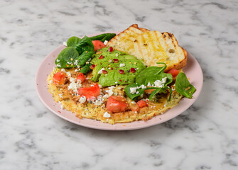 breackfast with avocado, bacond and fries