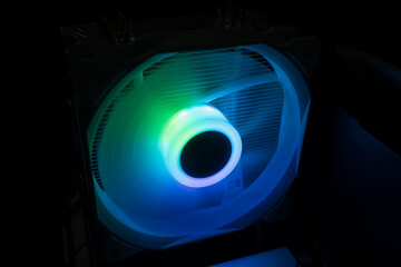 Computer cooling fans illuminated by internal LEDs