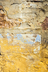 Old and Dirty Yellow Concrete Wall as Background