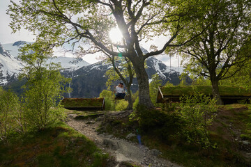 Briksdalsbre glacier. Late afternoon. Fast stream. Glacier waterfall. Spring in Norway. Jostedalsbreen National Park.