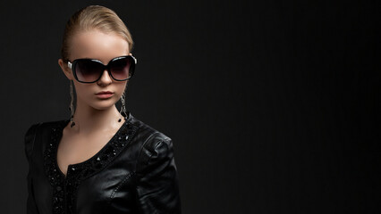 Beautiful young luxury model with big glasses-close up