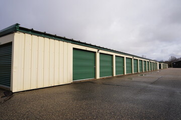 Fototapeta na wymiar Green door storage units for the community to use.