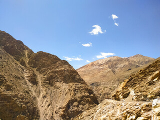Beautiful sand mountains with blue sky and clouds