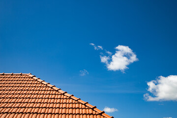 new red tiles roof and blue sky