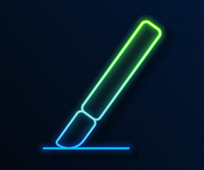 Obraz premium Glowing neon line Medical surgery scalpel tool icon isolated on blue background. Medical instrument. Vector