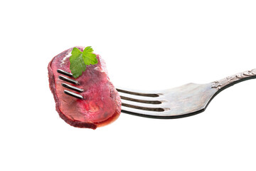 Dried meat beef jerky slice on fork isolated on white