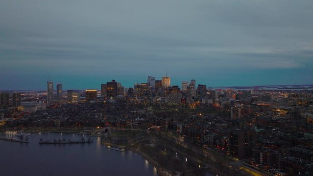 Aerial panoramic view of urban neighbourhood and high rise office buildings in background. Evening cityscape. Boston, USA