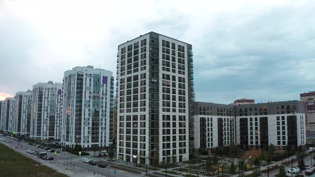 Academic district, Yekaterinburg city.Stock footage.A large new district of Yekaterinburg with high-rise new buildings,parking lots and parks and roads with cars.