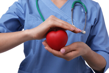 Doctor with stethoscope and red heart on white background, closeup. Cardiology concept